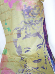 T-shirt Gaudi lunga fantasia tropicale e paillettes